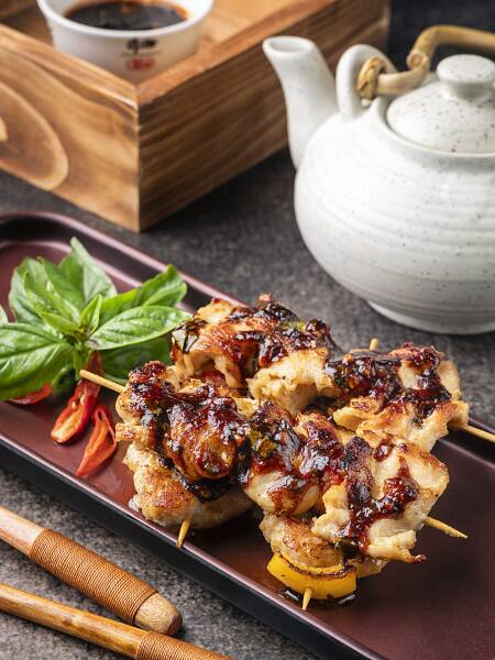 Vibrant celebratory Indo-Chinese diner, dish photographed in this style