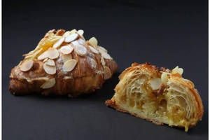 Polished cafe serving French-trained pastry, supporting dish in this style