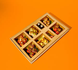 Craft-casual pan-Asian delivery aesthetic, supporting dish in this style